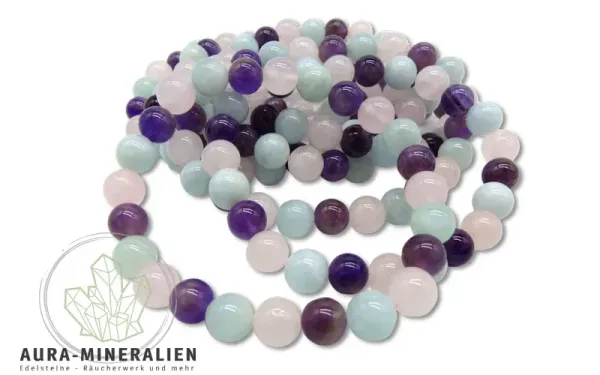 Hochwertiges Kugelarmband mit abwechselnd angeordneten Perlen aus hellblauem Aquamarin, violettem Amethyst und rosa Rosenquarz.