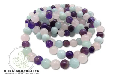 Hochwertiges Kugelarmband mit abwechselnd angeordneten Perlen aus hellblauem Aquamarin, violettem Amethyst und rosa Rosenquarz.