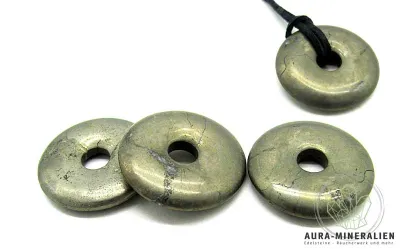 Goldfarbener Pyrit Donut aus Per...