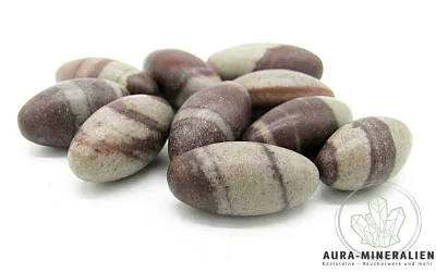 Shiva Lingam aus Sandstein und Tonstein aus dem Narmada Fluss in Indien