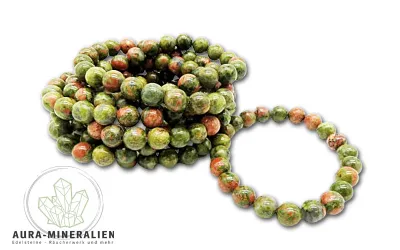 Unakit Kugelarmband aus grünem Epidot und rosa Feldspat mit Gummizug.